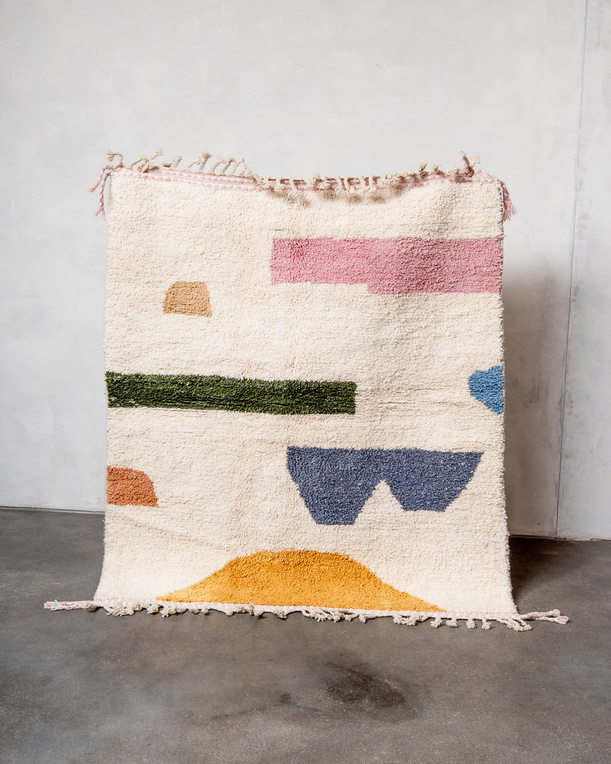 Modern, designer, handcrafted Berber rug from Morocco. Beniourain carpet with beautiful colours and patterns and fluffy wool texture.